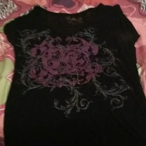 A black and purple apple bottoms shirt